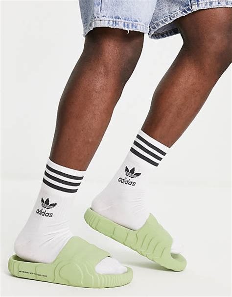 Say Goodbye to Boring Slides: Adidas adilette 22 in Magic Lime and Desert Sand